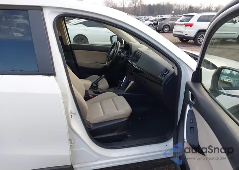 2013 Mazda Cx-5 Touring from USA, damaged, VIN JM3KE2CEXD0148702